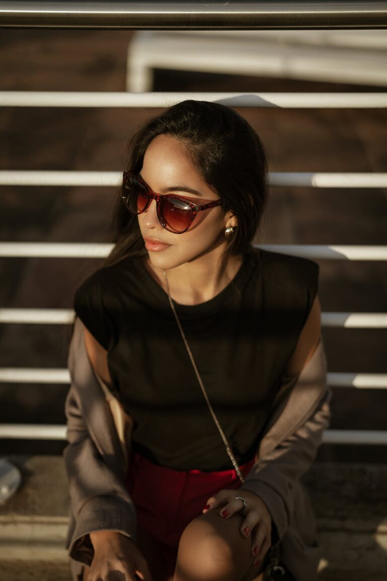 free-photo-of-portrait-of-a-pretty-brunette-wearing-sunglasses